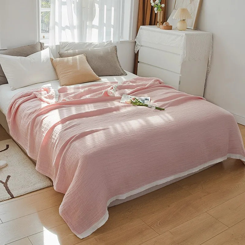 Couverture en mousseline de coton rose