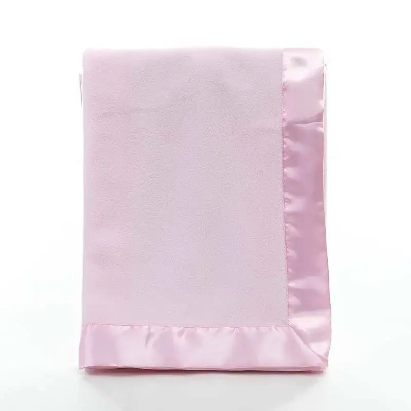 Image of Couverture bébé satinée rose – textile doux pour nourrisson