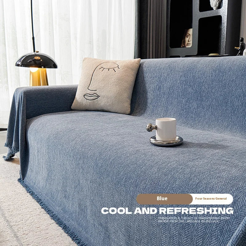 Couverture canapé avec pompon bleu