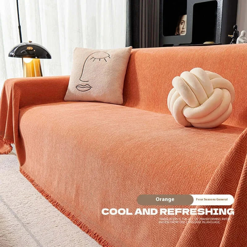 Couverture canapé avec pompon orange