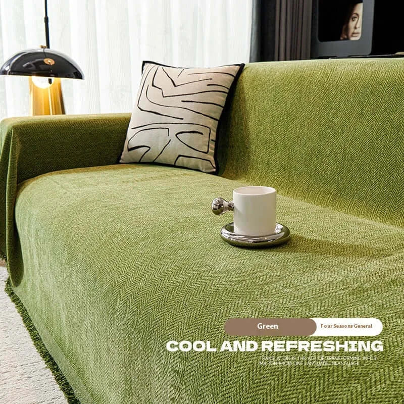 Couverture canapé avec pompon vert