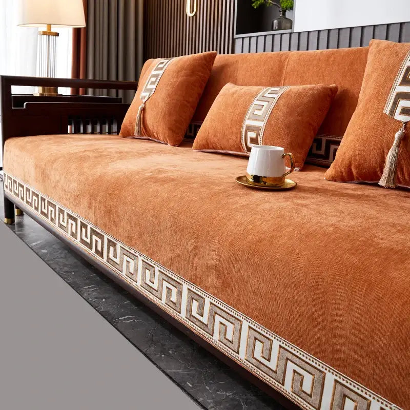 Image of Couverture canapé à rayures orange  design – plaid décoratif et confortable