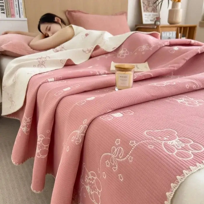 Couverture en jacquard coton rose
