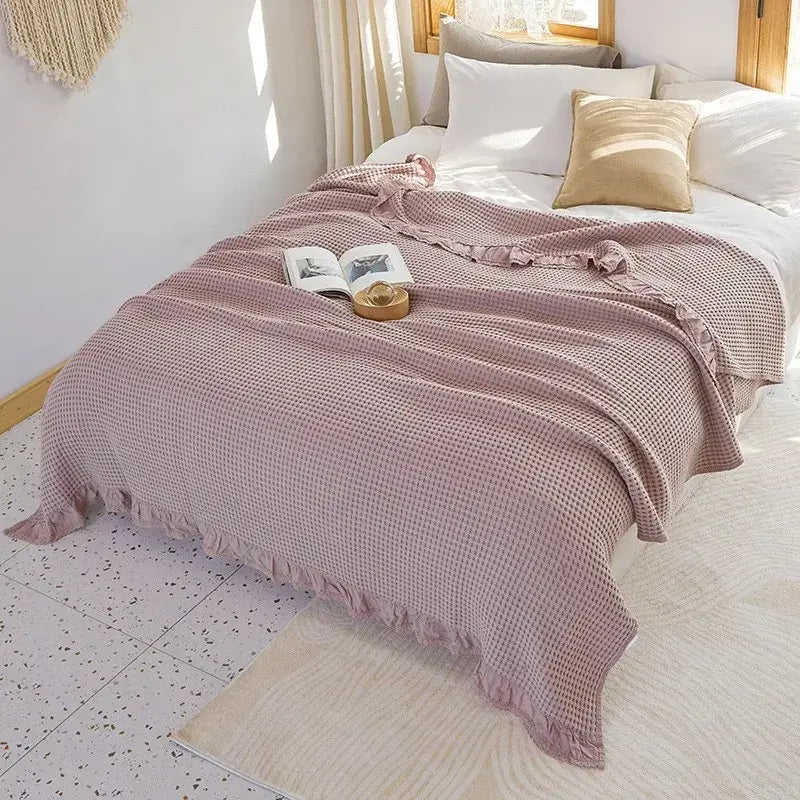 Couverture en mousseline de coton rose gaufré