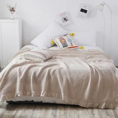 Couverture gaufrée en coton beige