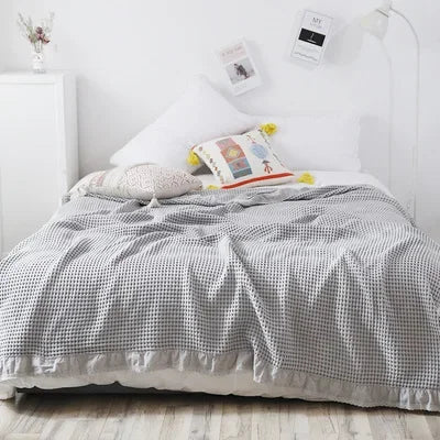 Couverture gaufrée en coton bleu