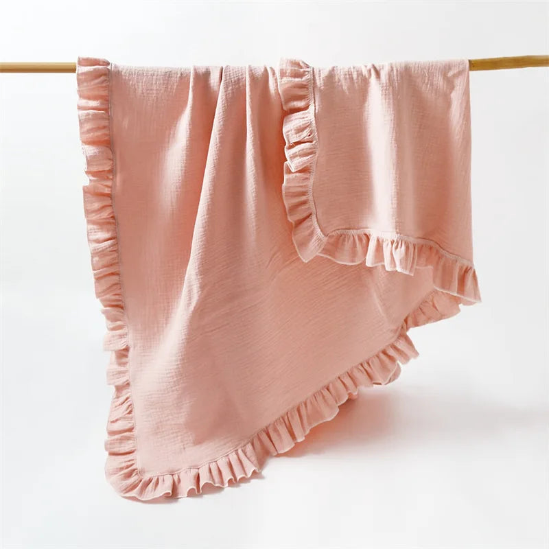 Couverture monochrome pour bébé corail